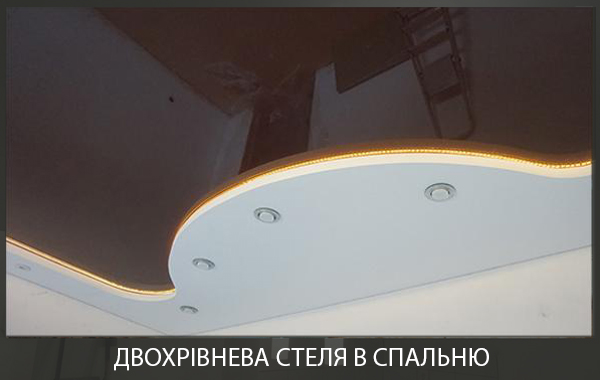 Натяжна стеля в спальні фото